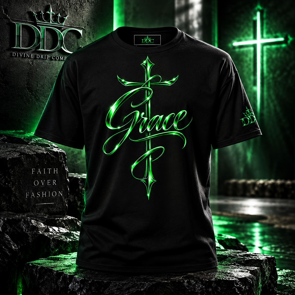 A black short-sleeve t-shirt with a glowing green graphic of a cross and the word 'Grace' in cursive, displayed on a dark, gothic-themed background with rocks and green lighting. The Divine Drift Comp logo is visible in the top left.