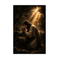 A vertical art print depicting Jesus kneeling in a forest, praying under dramatic golden sunbeams breaking through dark clouds. The print is shown centered on a clean white background.