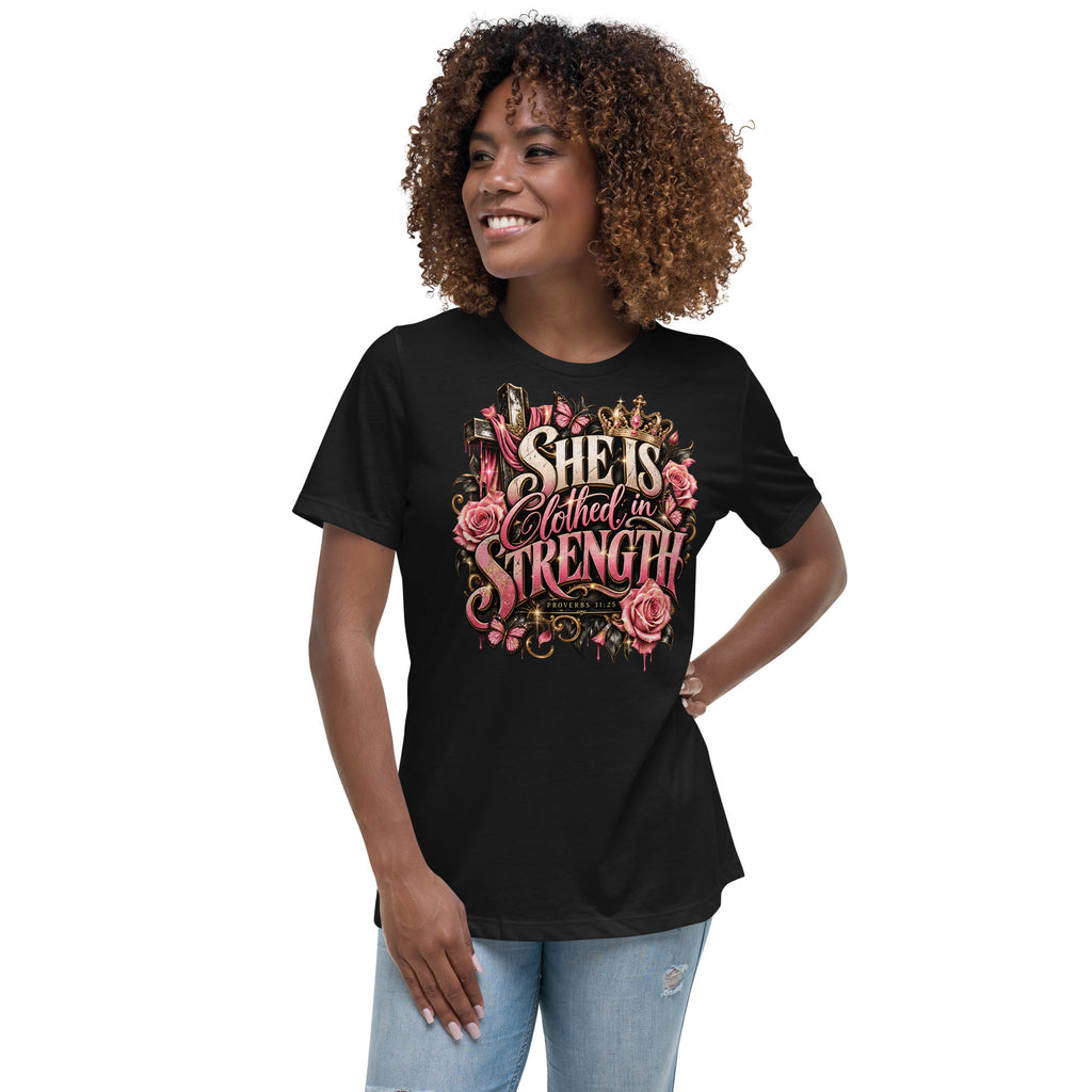 A woman with curly brown hair wearing a black graphic t-shirt and light wash jeans, standing against a plain white background. The t-shirt features a colorful graphic with the text 'SMOKE EAT AND SLEEP' in pink, purple, and green lettering alongside a cartoon illustration.
