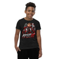 A young boy wearing a black graphic t-shirt with a red and white 'Armor Up' design, photographed against a solid white background.
